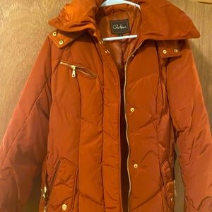 Copper colored Cole Haan jacket. Daughter wore one time. New without tags.